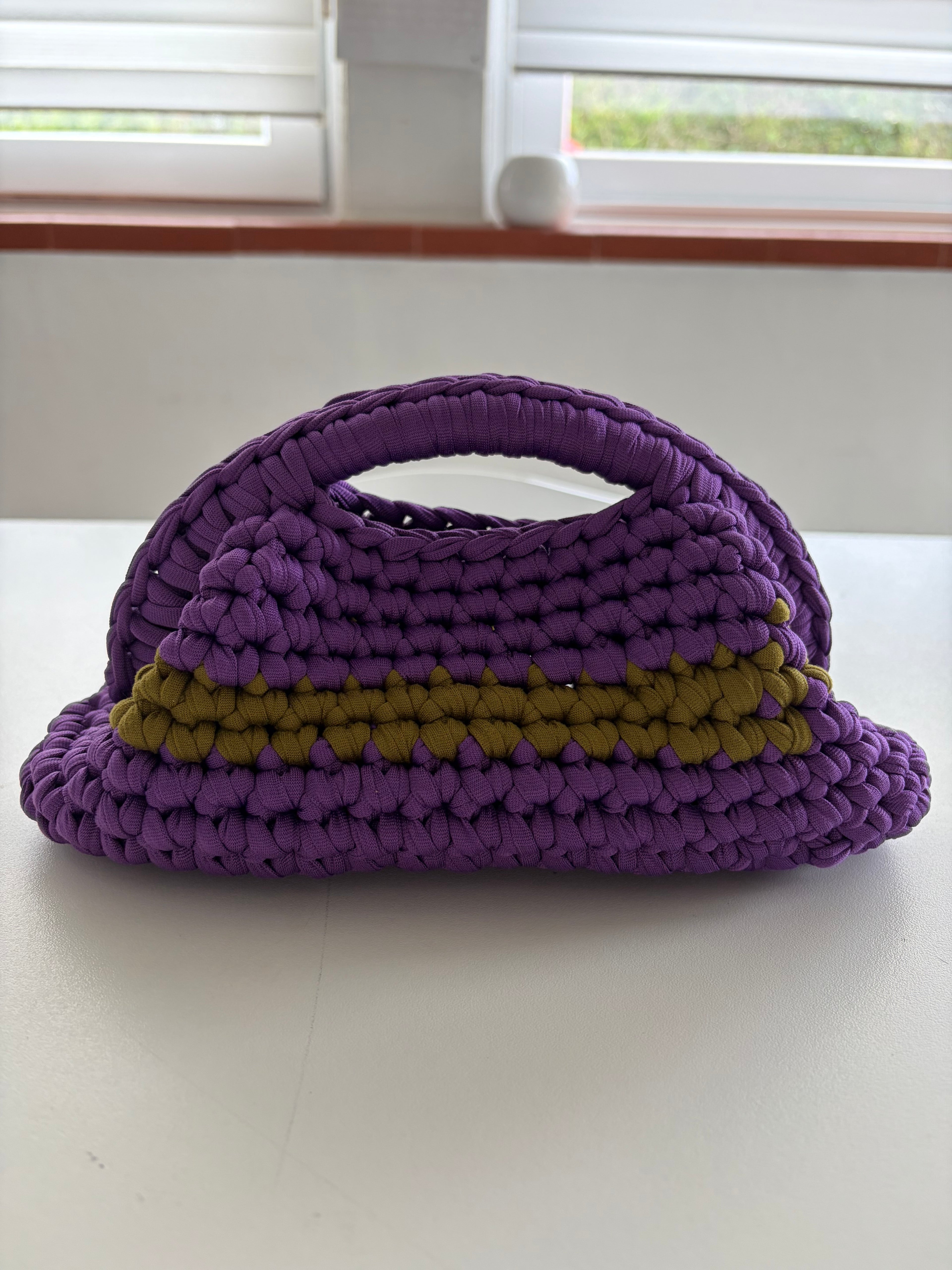 Clutch in fettuccia