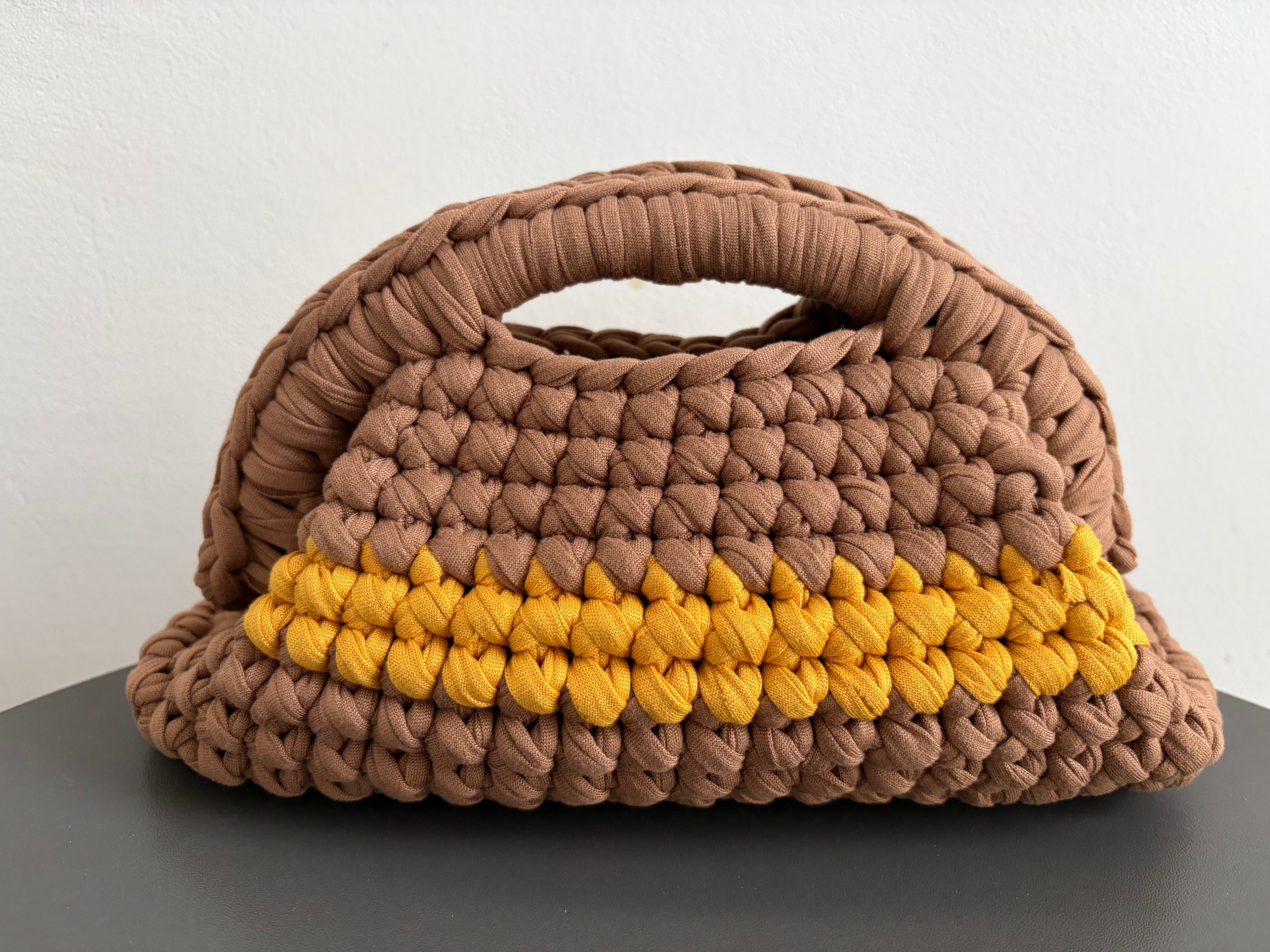 Clutch in fettuccia